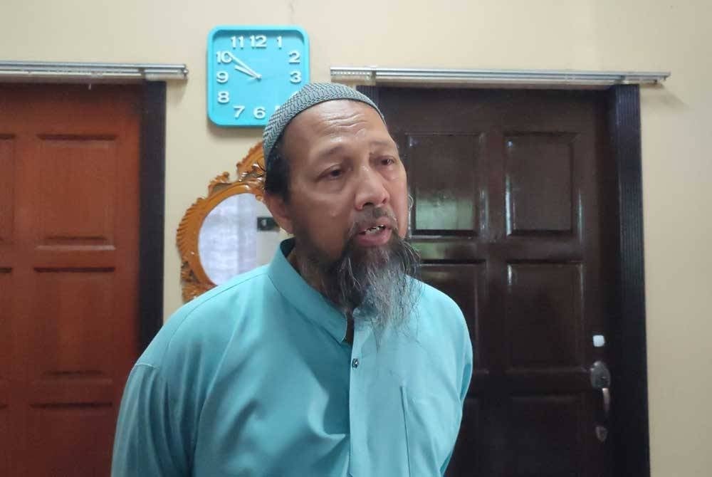 Bapa mangsa, Amzi Ishak.