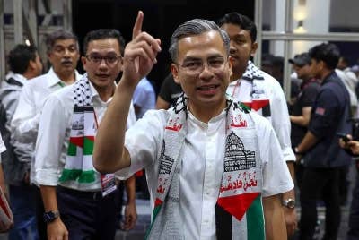 Fahmi menghadiri Himpunan Malaysia Bersama Palestin di Stadium Axiata Arena Bukit Jalil pada malam Selasa. - Foto Bernama