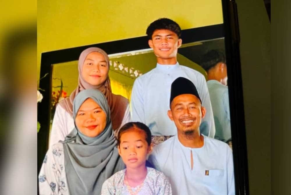 Gambar kenangan keluarga bersama Shahrunizam (belakang, kanan) ketika Aidilfitri lalu.