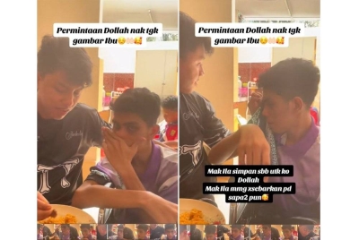 Abdullah (kanan) menangis semasa melihat gambar jenazah ibu bapanya yang meninggal dunia dalam kemalangan pada 1 September lalu.