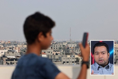 Akses Internet dan rangkaian telefon yang telah terputus sepenuhnya di seluruh Semenanjung Gaza pada Sabtu beransur pulih. - Foto AFP (Gambar kecil: Muhammad Nadir Al-Nuri)