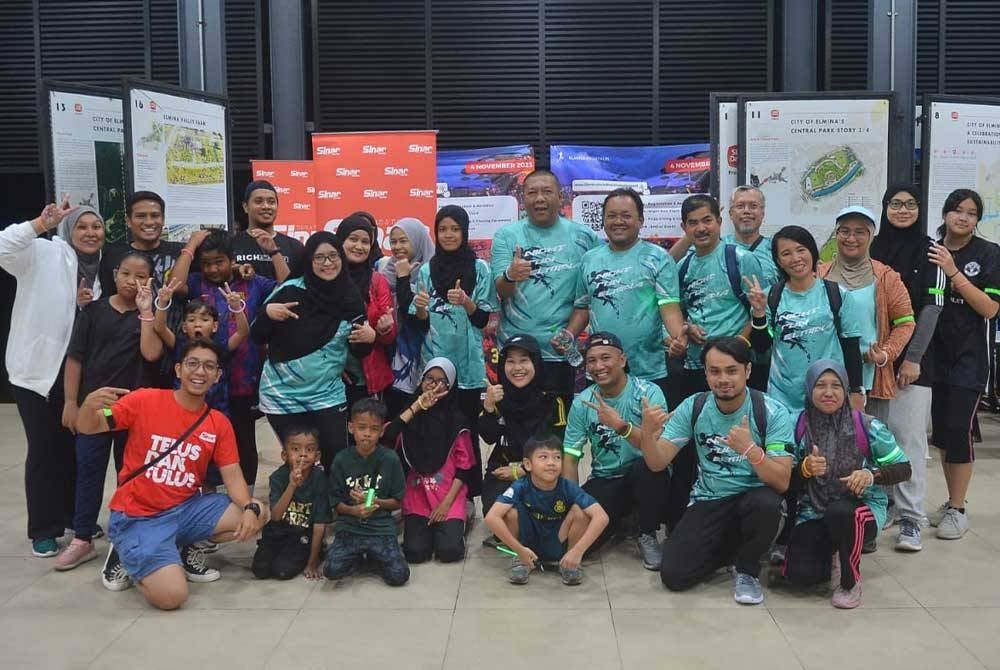 Staf Sinar Karangkraf yang menyertai program Elmina Night Run pada Sabtu.