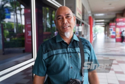 Badrul turut berbaju hijau sebagai sokongan untuk Palestin.