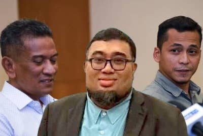 Muhamad Hakim (tengah).