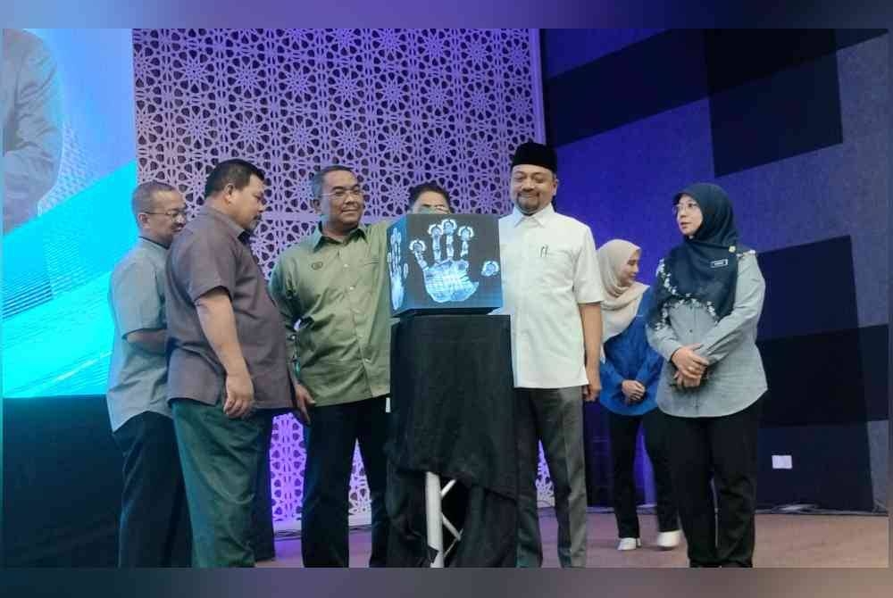 Sanusi merasmikan Program Publisiti dan Penyertaan Awam, Draf Rancangan Tempatan Majlis Daerah Baling 2035 (Penggantian) di Dewan Kenangan Tun Abdul Razak, Baling pada Khamis.