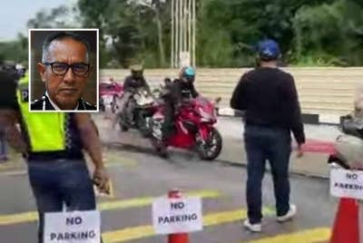 Video tular memaparkan anggota JSPT Bukit Aman melaksanakan pemeriksaan ke atas penunggang motosikal di kilometer 21 Lebuhraya Kuala Lumpur-Karak (arah Timur), di Gombak pada Ahad. Gambar kecil: Mohd Azman