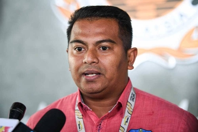 Amirul Hamizan bercakap ketika sidang media selepas Mesyuarat Jawatankuasa Kerja (JKK) di Majlis Sukan Negara hari ini. - Foto Bernama