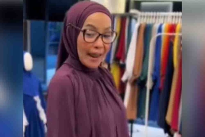 Tangkap layar video 'makcik Kemboja' yang mengundang kemarahan netizen baru-baru ini.