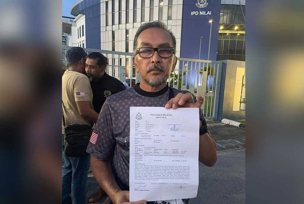 Zulfakar menunjukkan laporan polis dibuat.
