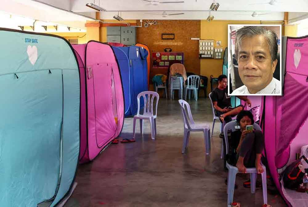 JKNK mengesan 102 kes penyakit berjangkit yang berlaku di PPS dalam tempoh dua minggu banjir melanda negeri ini. Gambar kecil: Dr Zaini