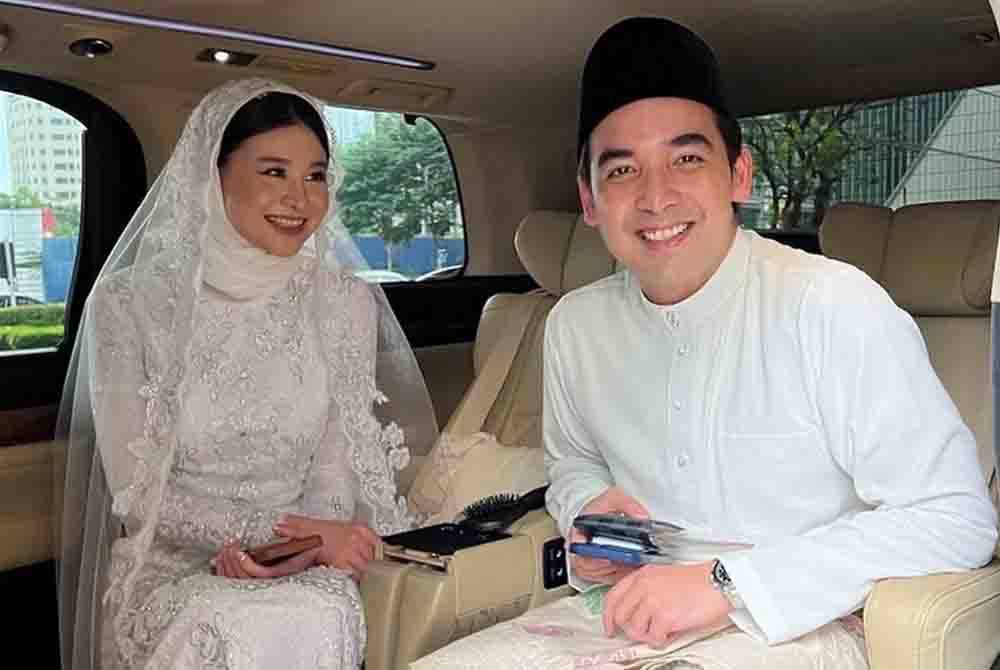 Norashman berkongsi gambarnya bersama Nikola yang anggun berbusana putih di Instagram.