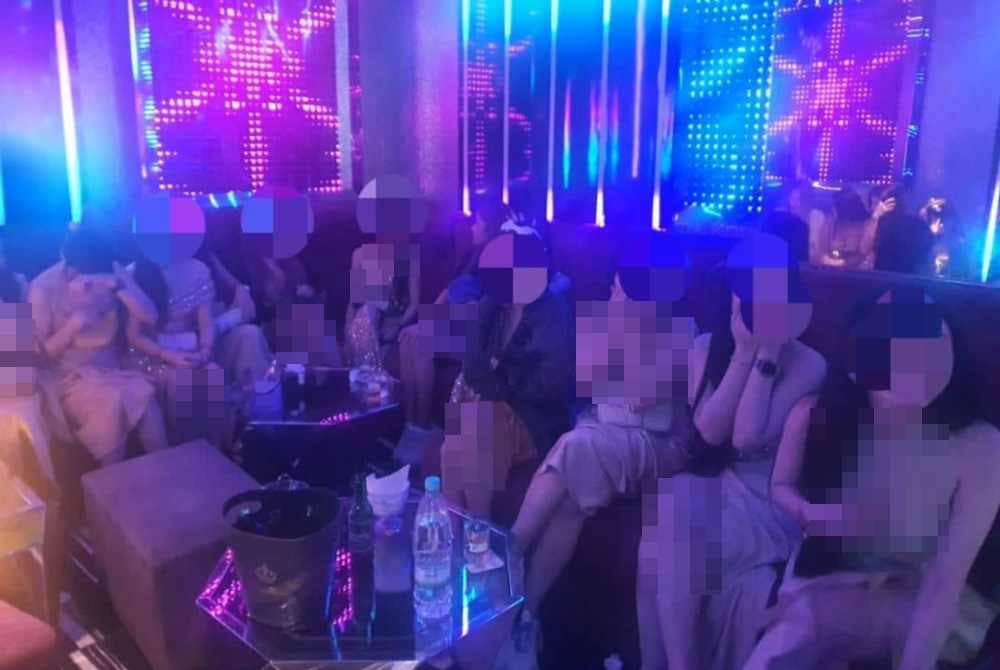 Antara wanita warga asing yang ditahan dalam serbuan di pusat hiburan terbabit pada Ahad.