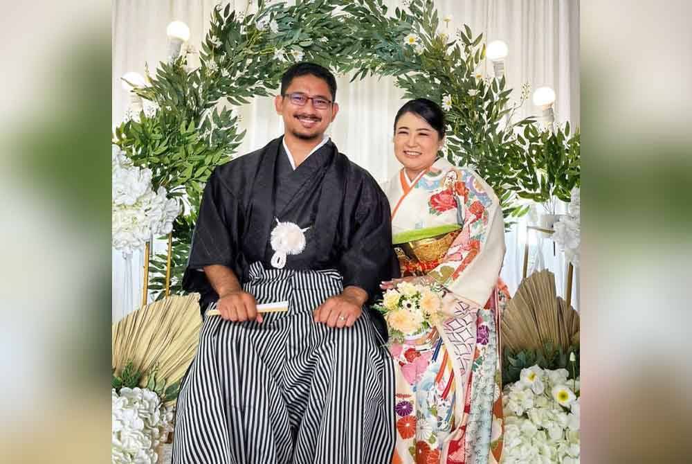 Hafiz dan Erika pada majlis resepsi mereka pada Sabtu lepas.