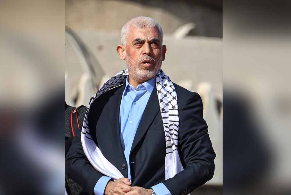 Yahya yang dirakamkan muncul semasa ulang tahun ke-35 kumpulan Hamas di Gaza City pada 14 Disember 2022. - Foto AFP