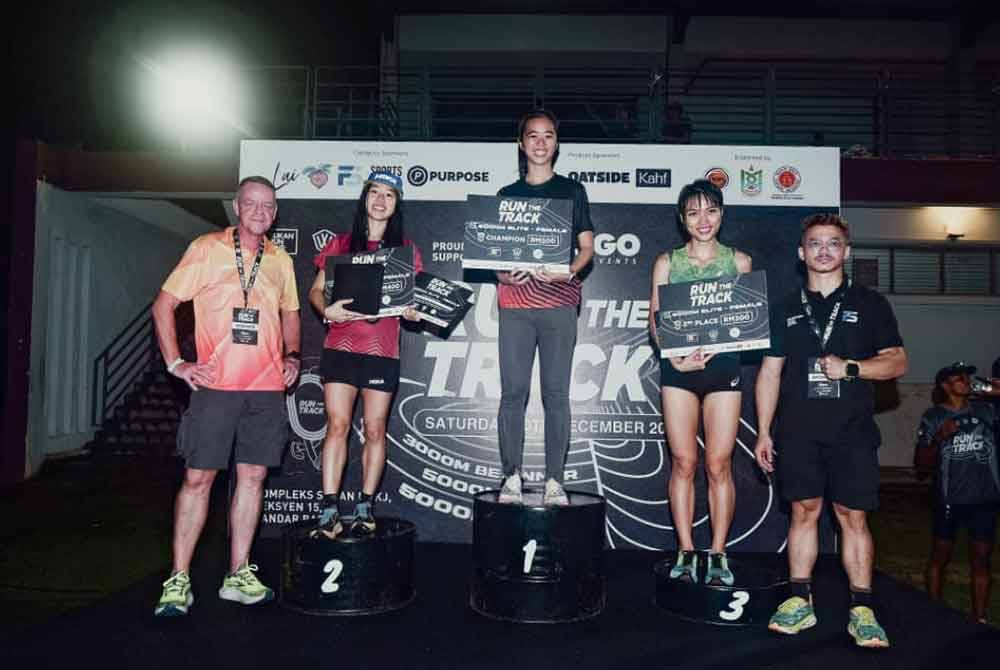 Chooi Fern (tengah) juara sulung 5000m (Jemputan) Run The Track.