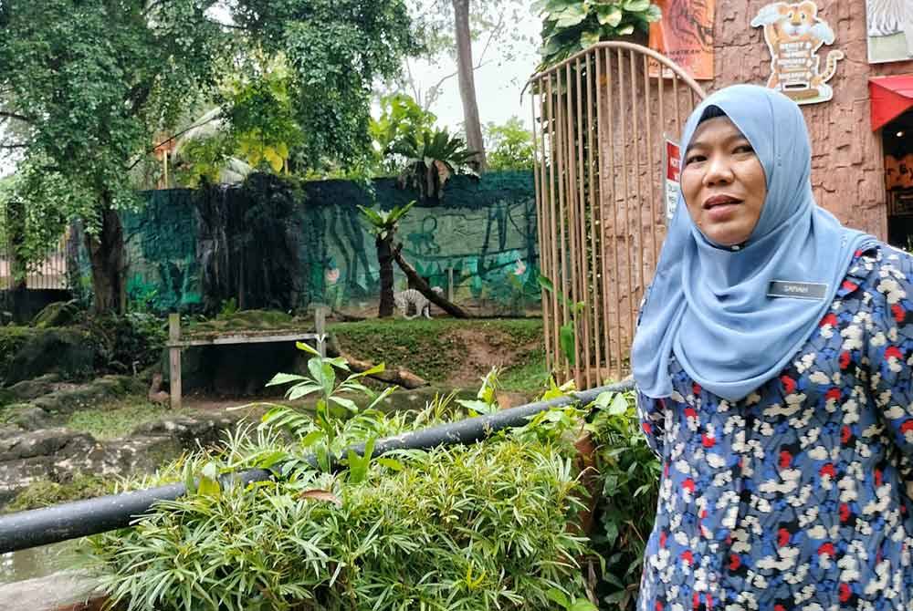 Sapiah ketika menunjukkan keadaan Elsa yang mengalami peningkatan berat badan berbanding 2019.