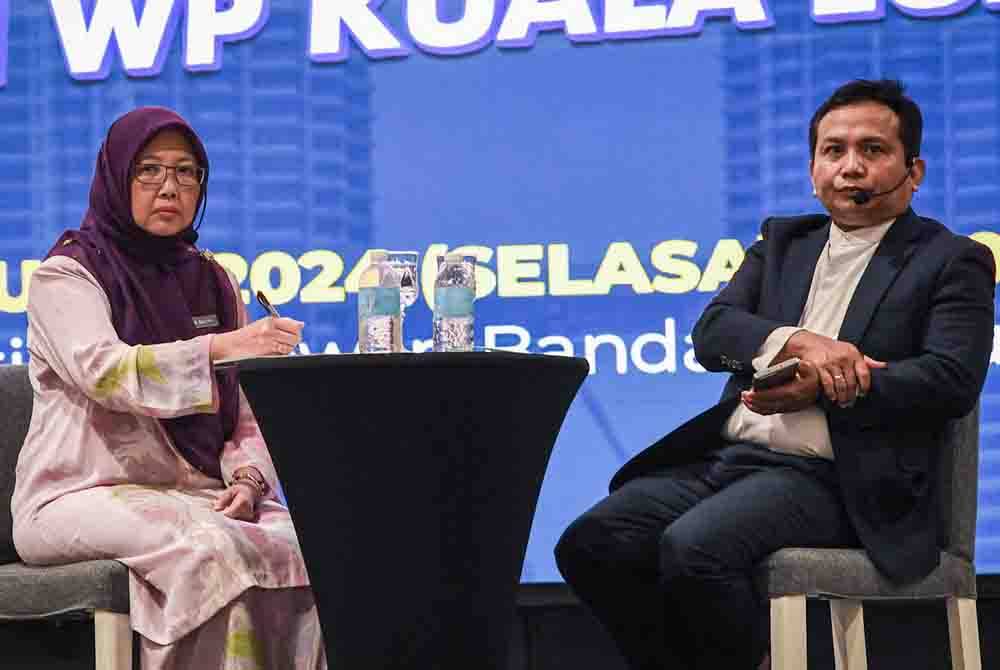 Menteri di Jabatan Perdana Menteri (Wilayah Persekutuan), Dr Zaliha Mustafa (kiri) ketika sesi Temu Rapat Dr Zaliha bersama warga Wilayah Persekutuan Kuala Lumpur di Institut Latihan Dewan Bandaraya Kuala Lumpur (IDB), pada Selasa. Foto Bernama