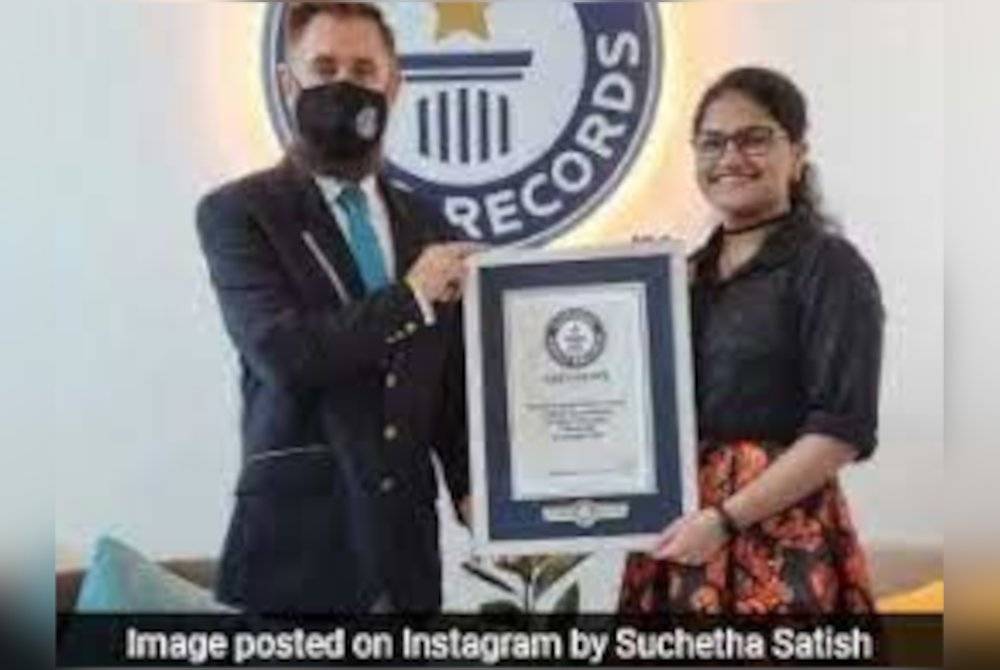 Suchetha Satish menerima sijil daripada wakil GWR baru-baru ini. - Agensi