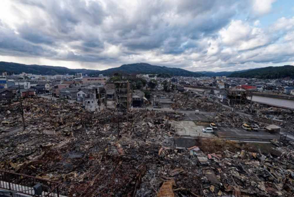 - Jumlah korban akibat bencana gempa bumi yang melanda wilayah Ishikawa di tengah Jepun kini mencecah seramai 213 orang pada Khamis. Foto Xinhua
