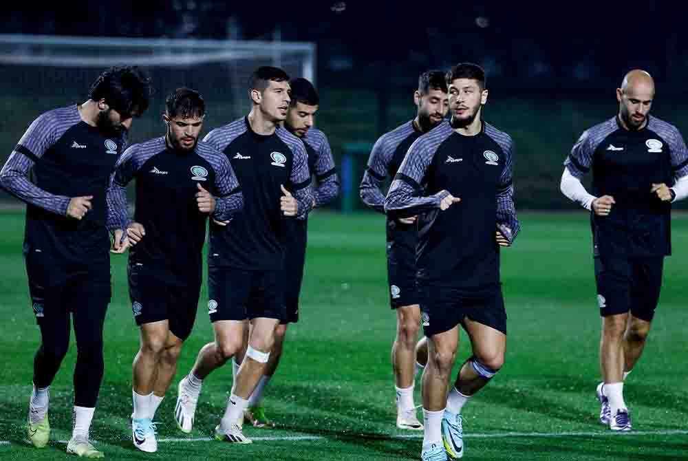 Pemain Palestin menjalani latihan sebelum menghadapi Piala Asia. FOTO: AFP