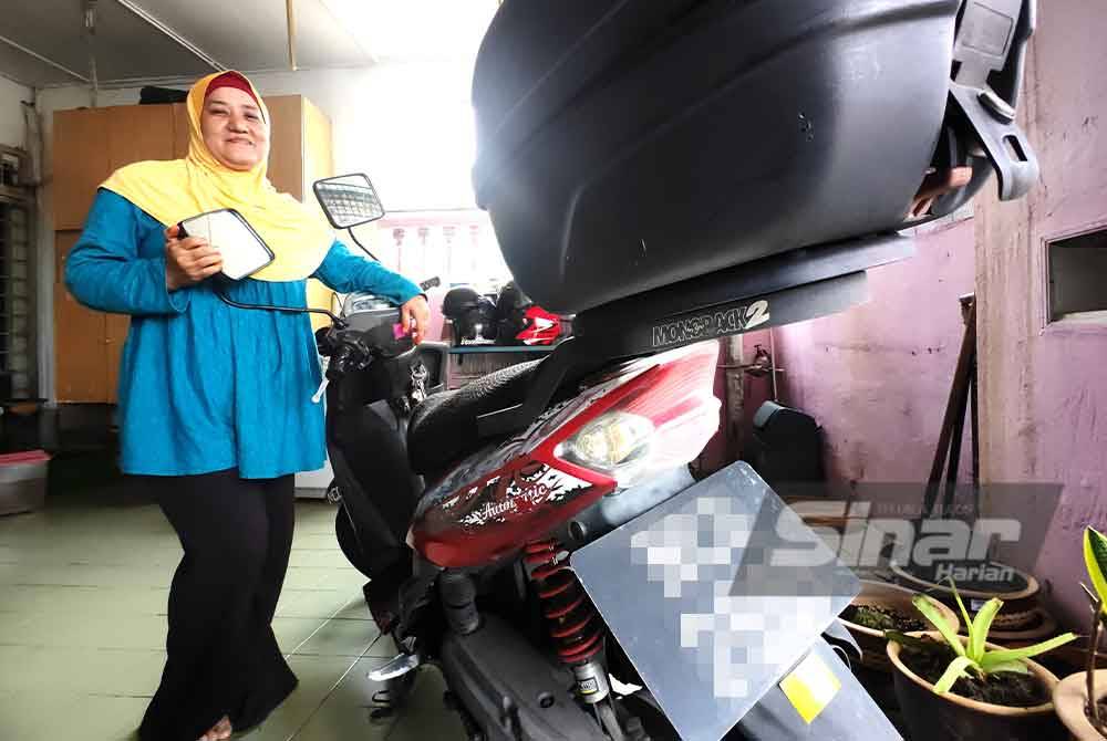 Siti Aminah tidak kisah kata-kata orang berkenaan motosikalnya.