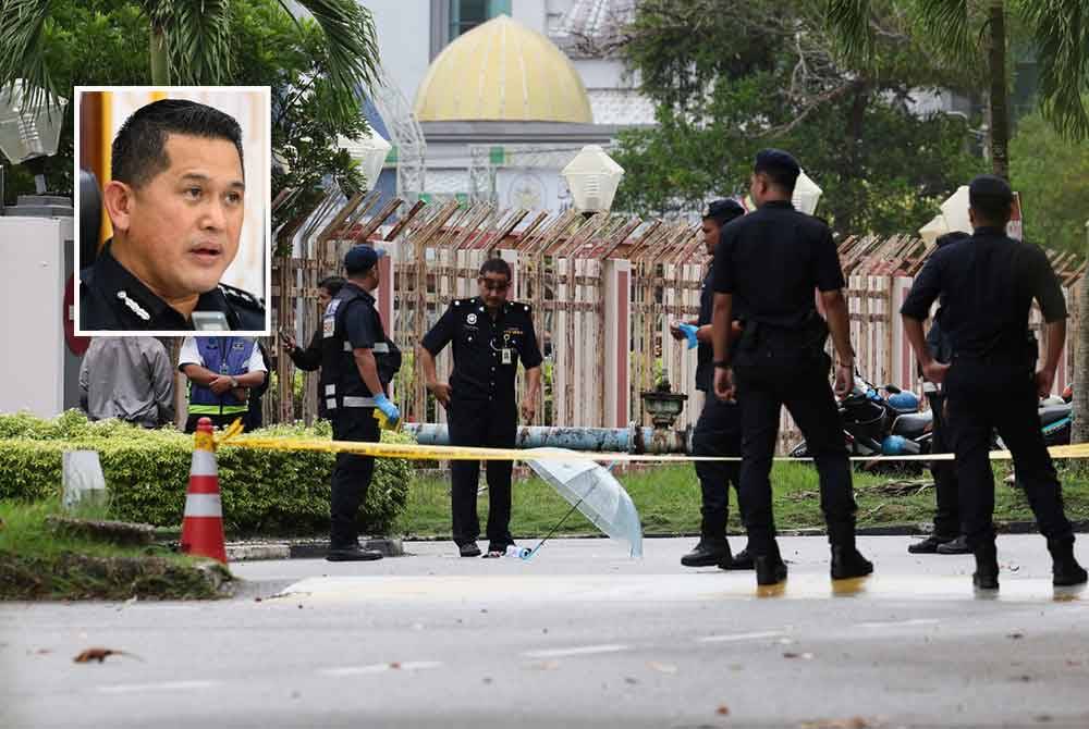 Pihak polis memeriksa bungkusan yang didakwa menyerupai bom diletakkan di pintu masuk Kompleks Mahkamah Kuala Terengganu pada Khamis. Gambar kecil: Mazli