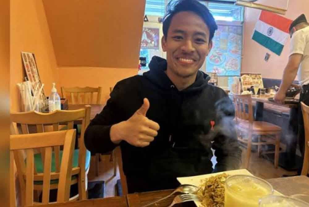 Luqman sedang menikmati juadah nasi beriani di salah satu restoran India di Yokohama, Jepun. Foto Stadium Astro