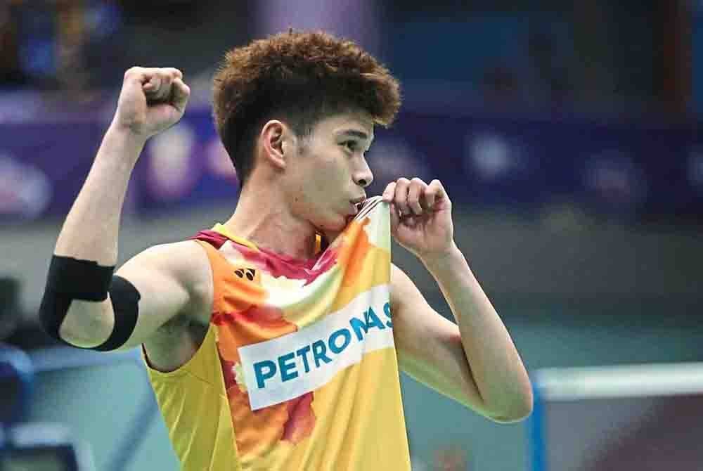 Jun Hao mara ke pusingan pertama setelah menewaskan pemain Singapura dalam aksi kelayakan Indonesia Masters pada Selasa. Foto Agensi