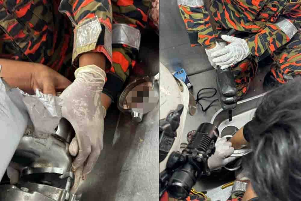 Pasukan bomba melakukan operasi mengeluarkan tangan mangsa yang tersepit pada mesin pengisar daging dalam kejadian di sebuah kafe di Taman Poh San, Tawau.