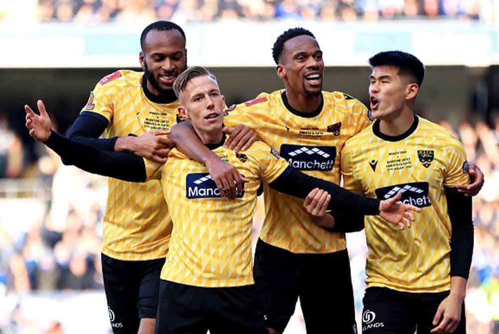 Corne meraikan jaringan kedua Maidstone ketika berdepan Ipswich di Portman Road. Foto: Agensi