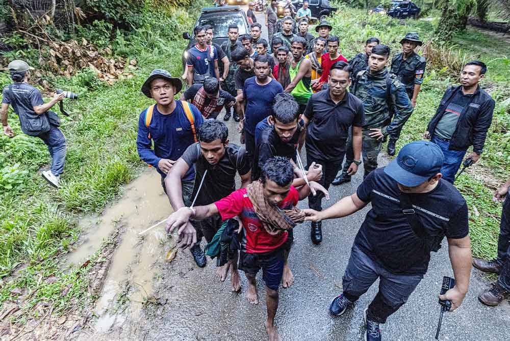 Usaha menangkap pendatang asing tanpa izin yang meloloskan diri dari Depot Imigresen Sementara Bidor giat dilakukan. Foto Bernama