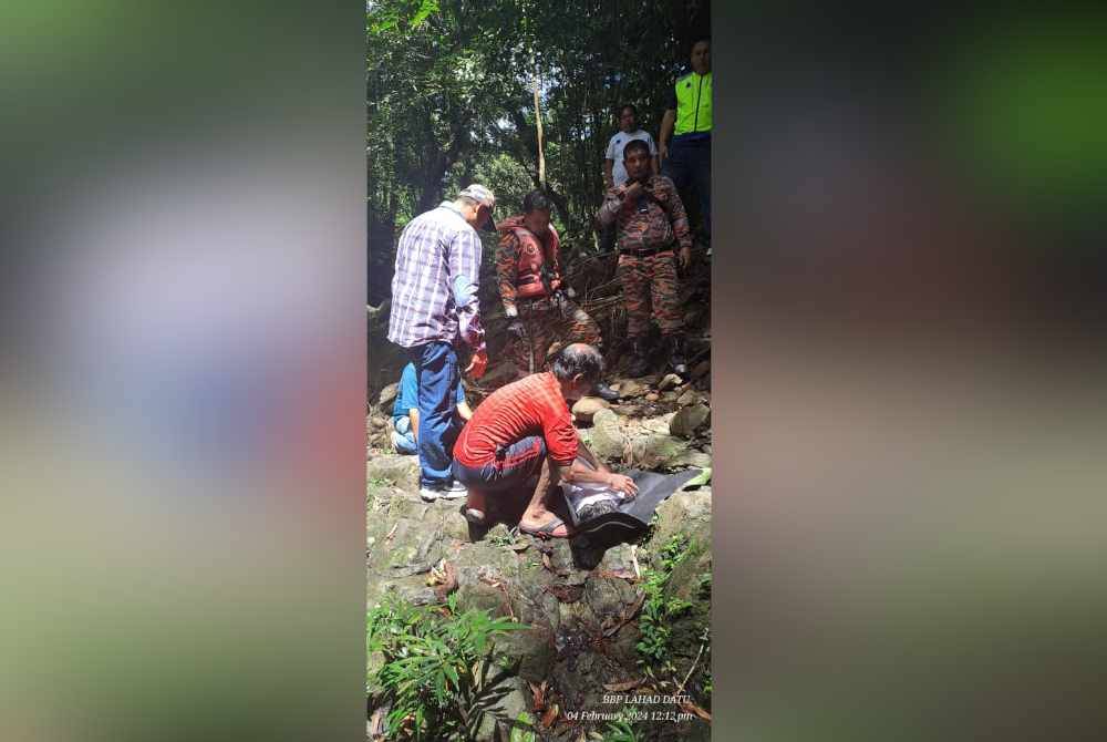 Mangsa lemas dibawa keluar dari kawasan air terjun di Lahad Datu.