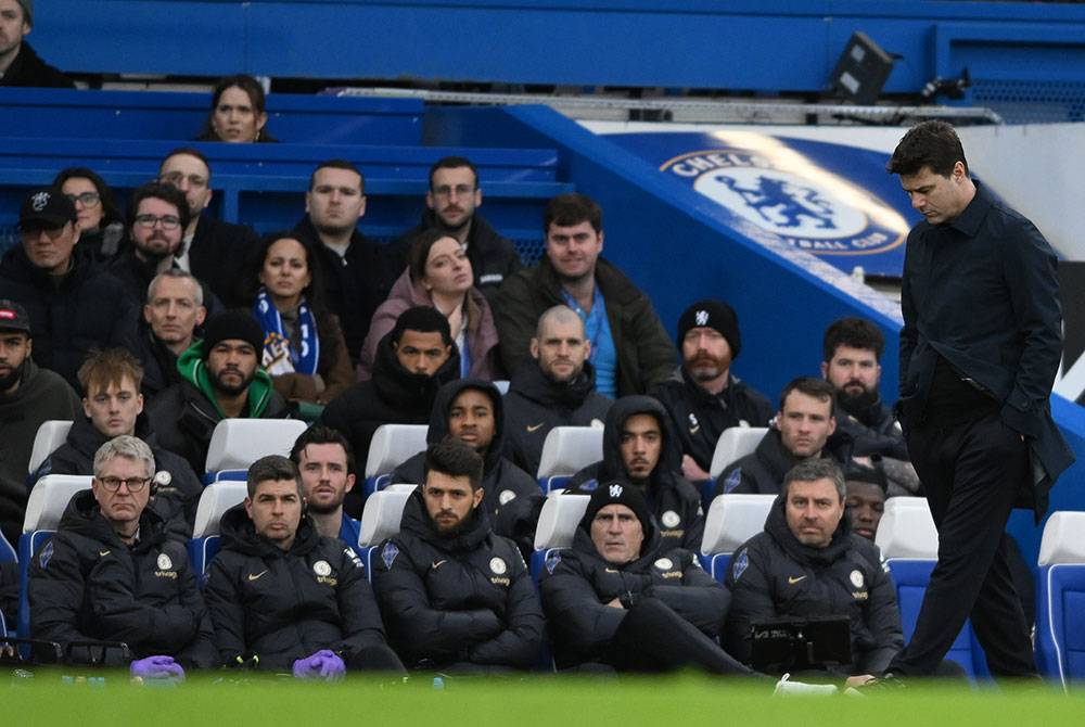 Pochettino (kanan) mengakui tekanan sebagai punca pasukannya tewas. Foto AFP