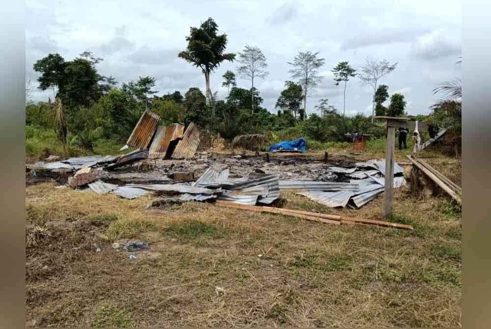Lokasi kejadian seorang wanita meninggal dunia selepas disimbah petrol dan dibakar oleh suaminya sendiri di Kampung Tinagalan, Sook.