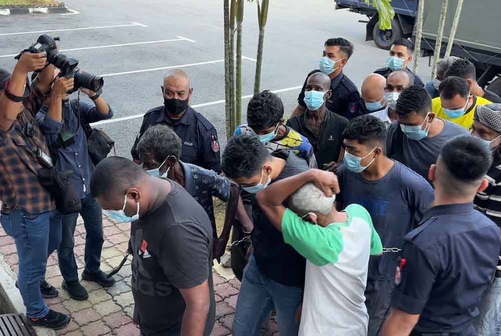Kelima-lima tertuduh dibawa bersama tertuduh lain ke Mahkamah Majistret Bukit Mertajam pada Jumaat.