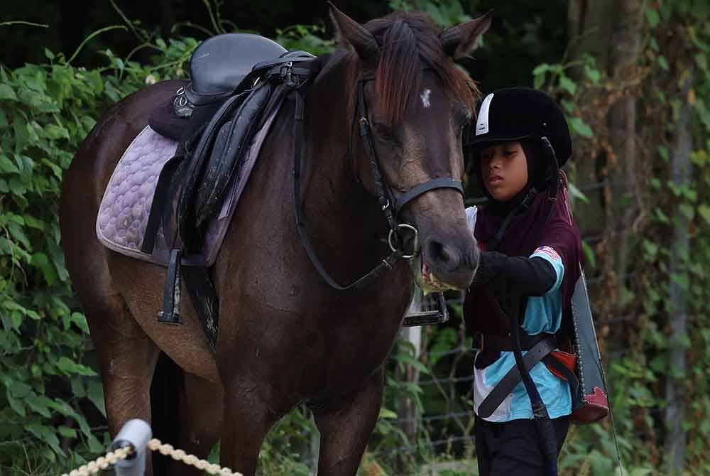 Walaupun sukan itu lebih didominasi golongan Adam, Heba Nusaybah sama sekali tidak gentar untuk bersaing sebaliknya bersedia mengukur tahap kemampuan diri. Foto Bernama