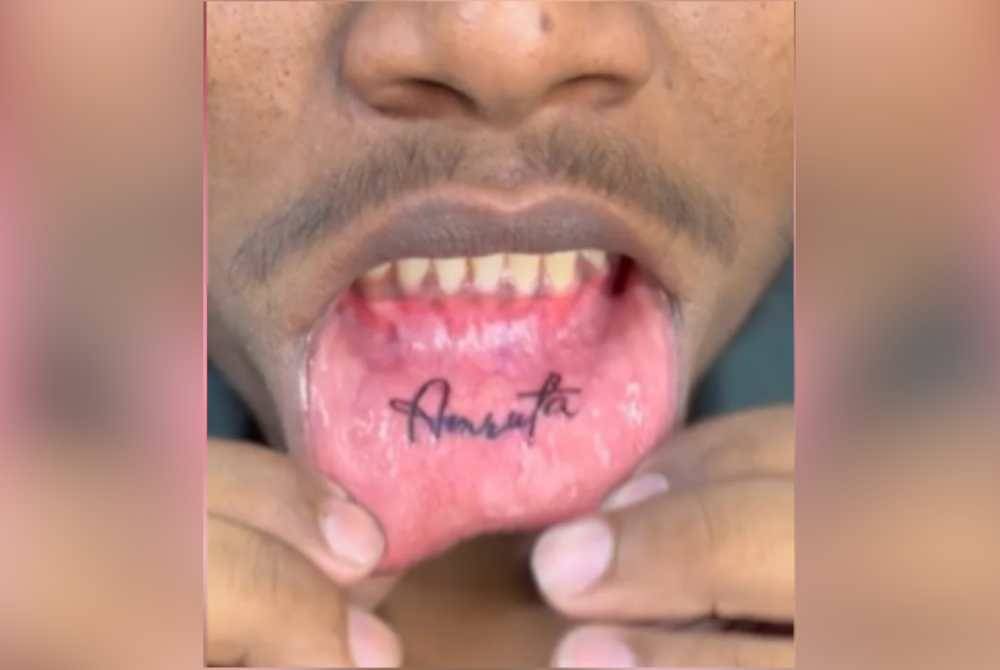 Tindakan 'gila' lelaki cacah tatu di dalam bibir cetus pelbagai komen dalam platform media sosial di India. Foto Agensi
