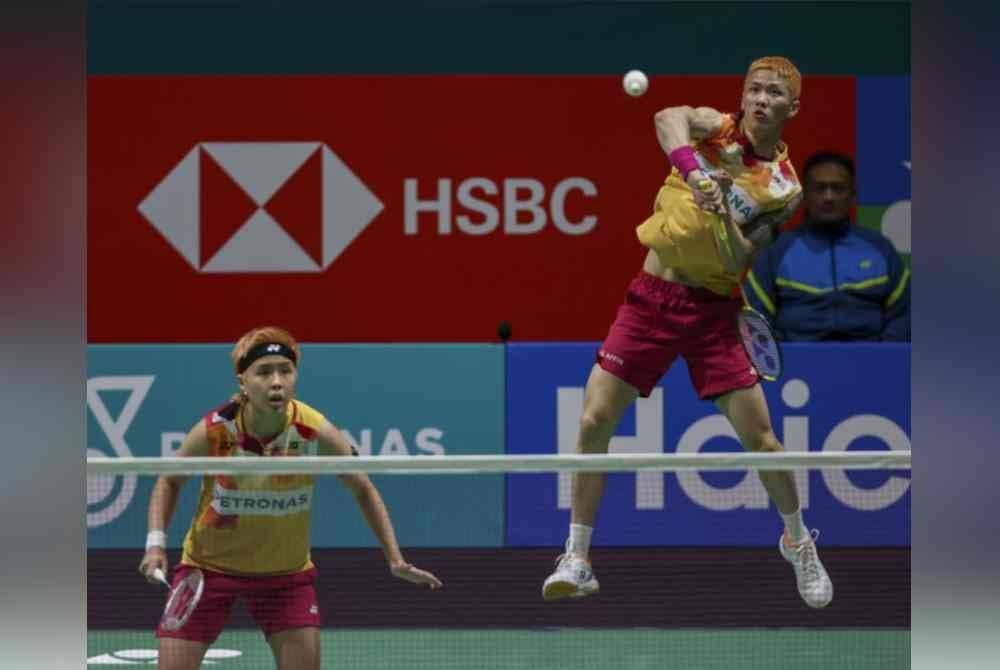 Tang Jie-Ee Wei terkandas di Terbuka Perancis selepas tewas kepada pasangan dari China, Feng Yan Zhe-Huang Dong Ping 18-21, 14-21. Foto fail Bernama
