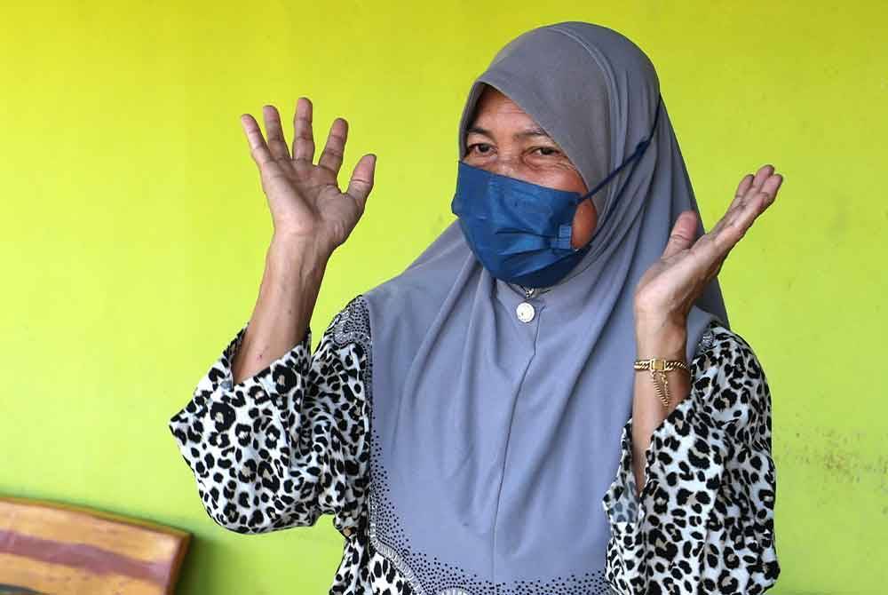 Reaksi balu kepada pengasas ajaran sesat Ayah Pin atau nama sebenarnya Ariffin Muhamad. Foto Bernama