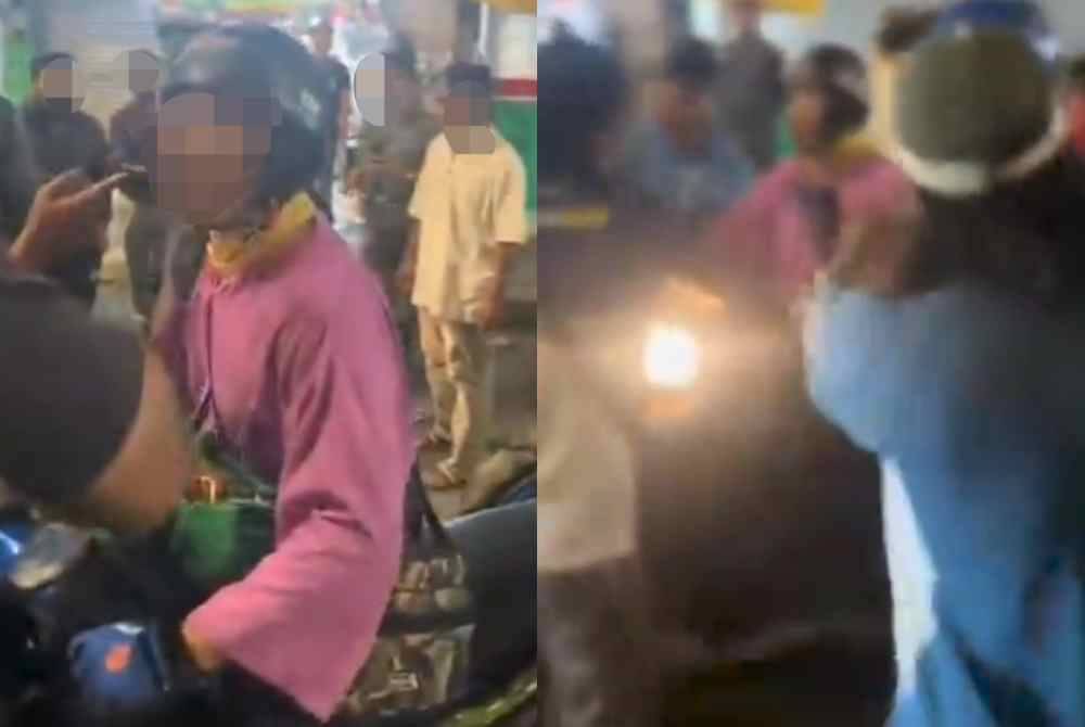 Tangkap layar video tular memaparkan seorang lelaki dikerumuni sekumpulan individu selepas didakwa mencuri telefon bimbit.