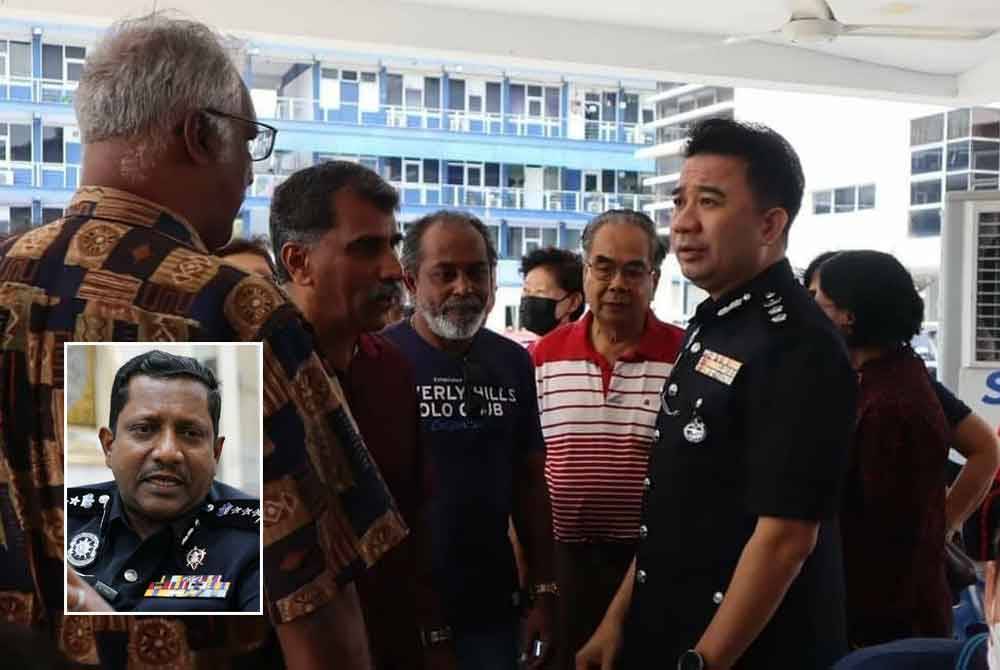 Ketua Polis Daerah Klang Selatan, Asisten Komisioner Cha Hoong Fong (kanan) beramah mesra dengan orang ramai yang hadir ke IPD Klang Selatan, pada Sabtu. Gambar kecil: Hussein
