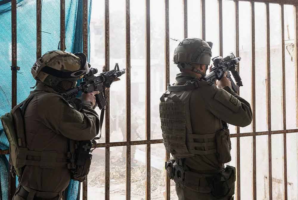 Perintah kejam itu membenarkan tentera Israel menembak mana-mana orang awam yang memasuki 'zon penghapusan' ditetapkan di Gaza. Foto AFP