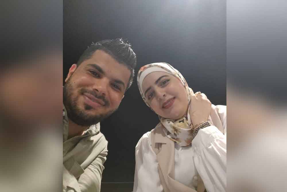 Khalid Jamil Hammouda bersama isterinya, Maryam.