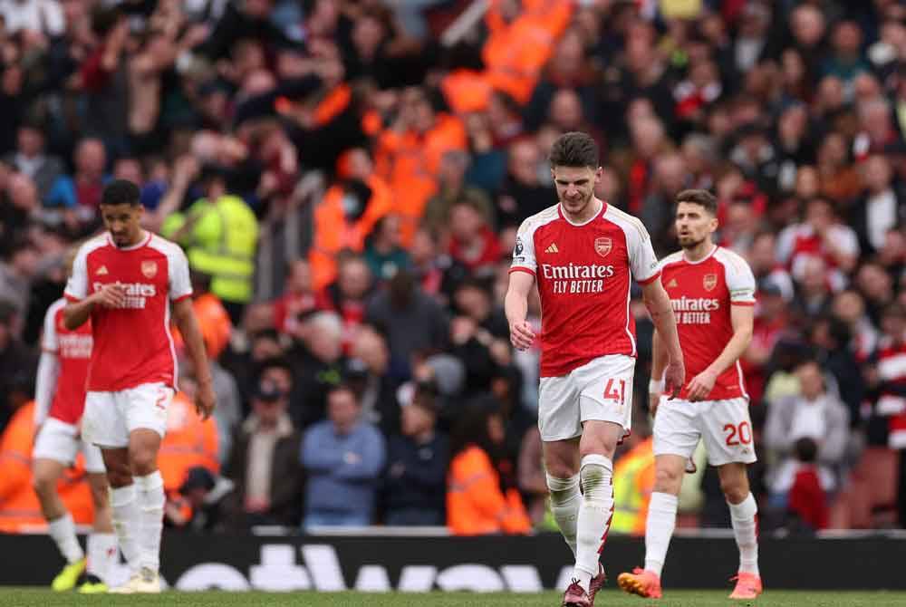 Rice (dua dari kanan) mahu memastikan kebangkitan ketika menentang Bayern. Foto AFP