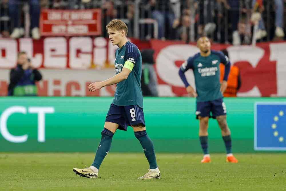 Reaksi pemain Arsenal selepas tewas kepada Bayern. Foto EPA