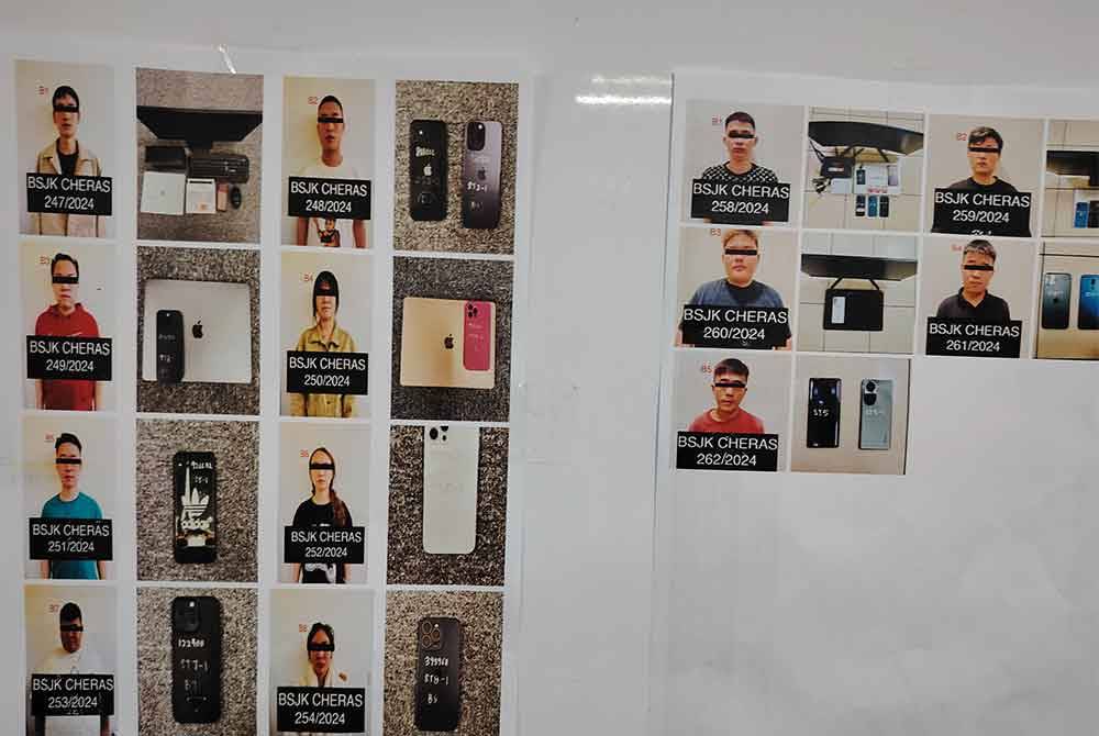 Antara suspek yang diberkas polis dalam serbuan di pusat panggilan penipuan di ibu negara, baru-baru ini.