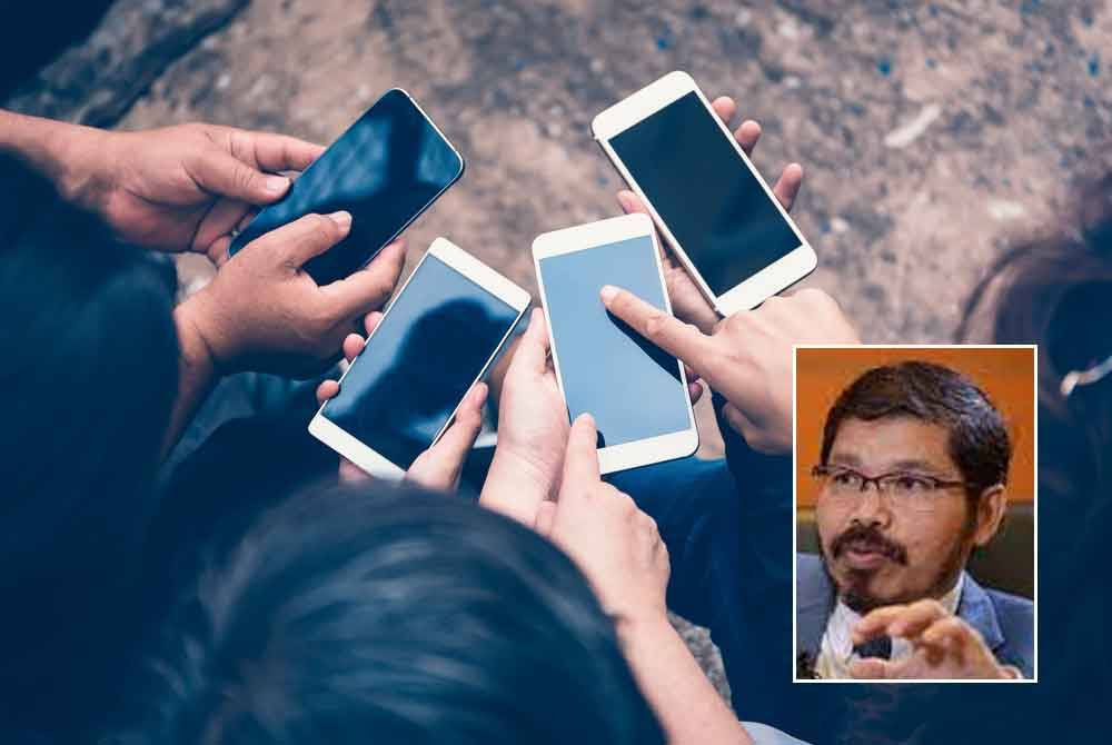 97.6 peratus rakyat Malaysia memilih telefon pintar manakala 16.3 peratus lagi masih mempunyai capaian ke atas telefon biasa - Gambar hiasan 123RF