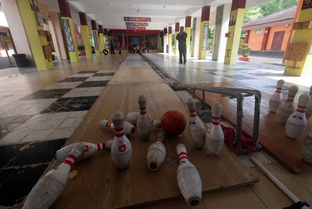 Lorong boling diperbuat daripada papan lapis bersaiz tebal, paip PVC dan simen. Foto Bernama