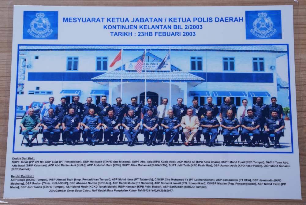 Muhammad Fuad (enam kiri) ketika menghadiri mesyuarat di Ibu Pejabat Polis Kontinjen Kelantan.