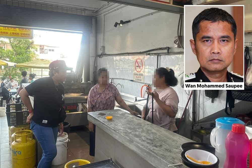 Antara warga asing yang ditahan dalam serbuan kedai makan di Bandar Baru Sri Petaling, Kuala Lumpur pada Selasa.